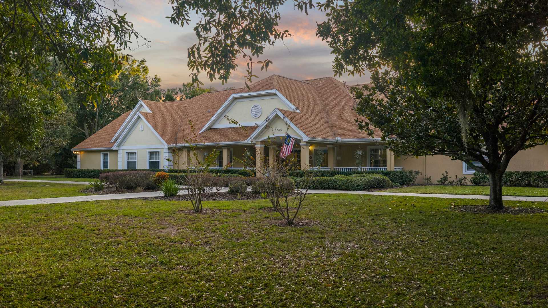 exterior entrance with covered seating and entryway